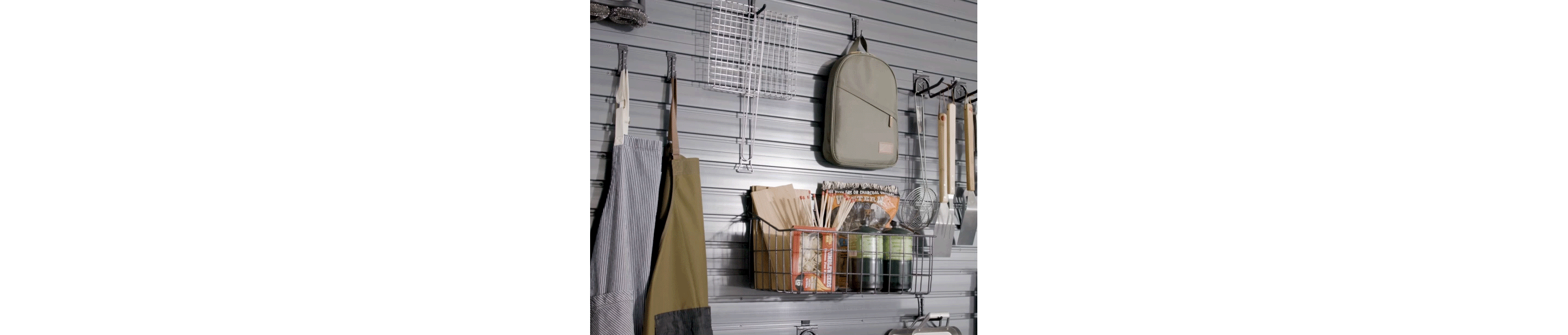 An animated GIF showing different close-ups of a wall. Each close-up features GearWall Panels with a variety of these items hanging: aprons, kitchen utensils, several pans and baskets with propane tanks, matches and other items.